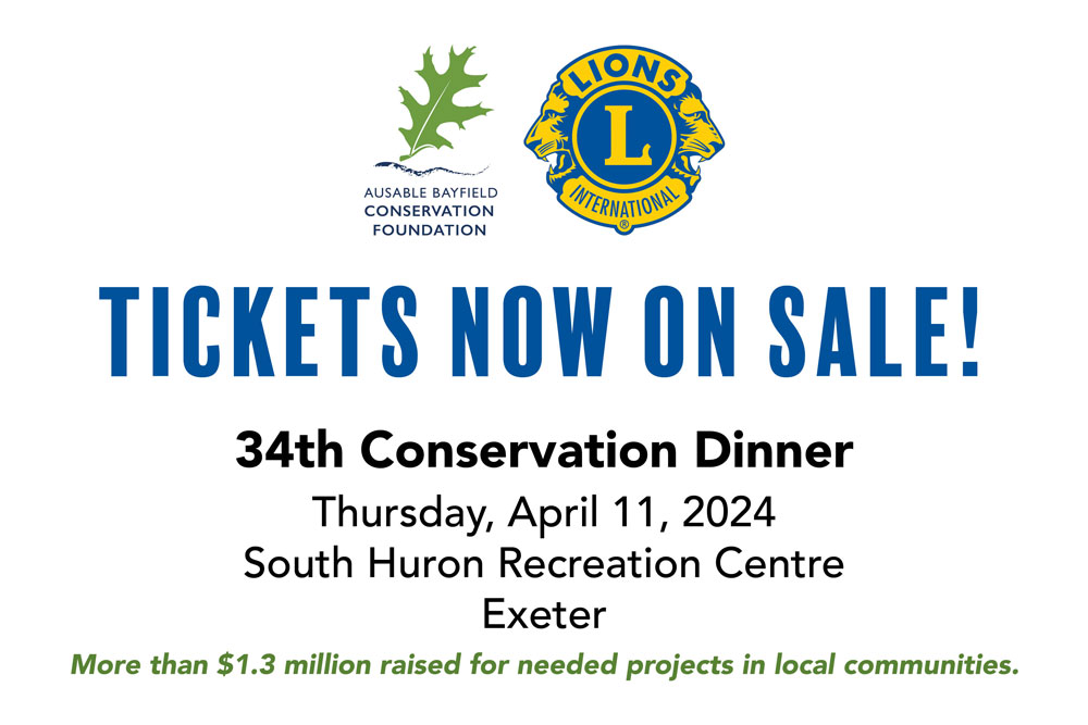 A poster saying Conservation Dinner 2024 tickets are on sale now.
